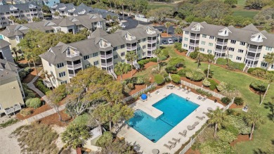 Experience coastal living at its finest in this beautifully on Wild Dunes Harbor Golf Resort in South Carolina - for sale on GolfHomes.com, golf home, golf lot