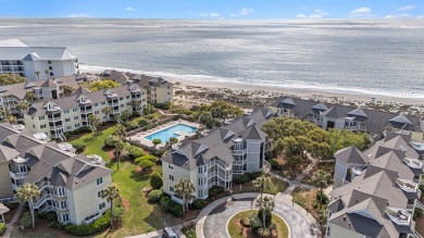 Experience coastal living at its finest in this beautifully on Wild Dunes Harbor Golf Resort in South Carolina - for sale on GolfHomes.com, golf home, golf lot
