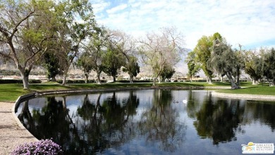 Built in 1974, this 1152 sq foot double wide bungalow is ready on Date Palm Country Club in California - for sale on GolfHomes.com, golf home, golf lot