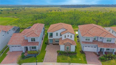 Discover unparalleled luxury and comfort in this exquisite on Eagle Creek Golf Club in Florida - for sale on GolfHomes.com, golf home, golf lot