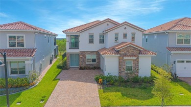 Discover unparalleled luxury and comfort in this exquisite on Eagle Creek Golf Club in Florida - for sale on GolfHomes.com, golf home, golf lot