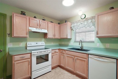 Welcome to this beautiful maintained 2-bedroom, 2 bath  Austin on The Links of Spruce Creek in Florida - for sale on GolfHomes.com, golf home, golf lot