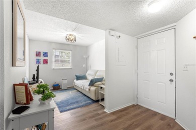 This IMMACULATE, FIRST FLOOR condo is just what you've been on Country Club At Silver Springs Shores in Florida - for sale on GolfHomes.com, golf home, golf lot