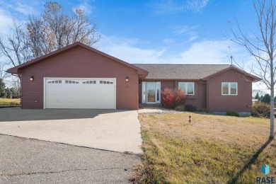 Looking for the perfect lakeside retreat? This stunning home on on Lakes Golf Course in South Dakota - for sale on GolfHomes.com, golf home, golf lot