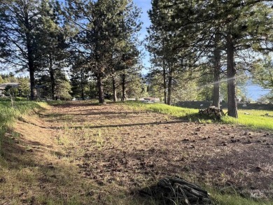 Prime .49 Acre Escape located directly across the street from on Cascade Golf Course in Idaho - for sale on GolfHomes.com, golf home, golf lot