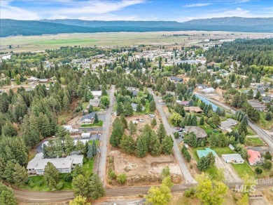Prime .49 Acre Escape located directly across the street from on Cascade Golf Course in Idaho - for sale on GolfHomes.com, golf home, golf lot