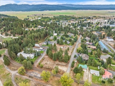 Prime .49 Acre Escape located directly across the street from on Cascade Golf Course in Idaho - for sale on GolfHomes.com, golf home, golf lot