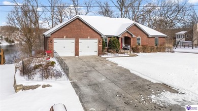 Welcome to 190 Strawberry Circle, a rare lakefront home for sale on Doe Valley Country Club in Kentucky - for sale on GolfHomes.com, golf home, golf lot