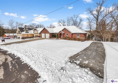 Welcome to 190 Strawberry Circle, a rare lakefront home for sale on Doe Valley Country Club in Kentucky - for sale on GolfHomes.com, golf home, golf lot