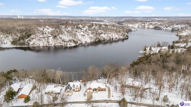 Welcome to 190 Strawberry Circle, a rare lakefront home for sale on Doe Valley Country Club in Kentucky - for sale on GolfHomes.com, golf home, golf lot