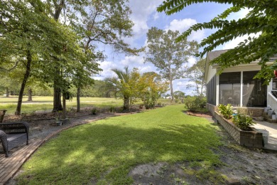Lovely patio home w/ golf course views of the #1 Fairway on The on Players Course At Wyboo Plantation in South Carolina - for sale on GolfHomes.com, golf home, golf lot