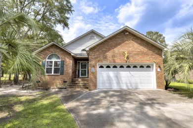 Lovely patio home w/ golf course views of the #1 Fairway on The on Players Course At Wyboo Plantation in South Carolina - for sale on GolfHomes.com, golf home, golf lot