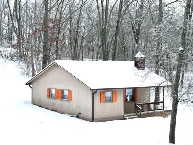 Welcome to your perfect little getaway! This charming cottage on Carnico Golf Course in Kentucky - for sale on GolfHomes.com, golf home, golf lot