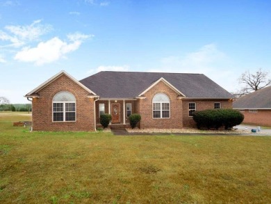 Beautiful 4 bedroom home with screened backporch overlooking on Beech Creek Golf Club in South Carolina - for sale on GolfHomes.com, golf home, golf lot
