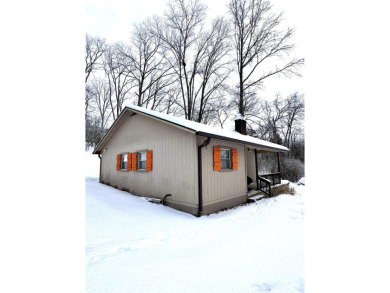 Welcome to your perfect little getaway! This charming cottage on Carnico Golf Course in Kentucky - for sale on GolfHomes.com, golf home, golf lot