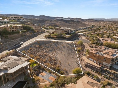 Perched on a 0.79-acre elevated lot in the prestigious MacDonald on Dragon Ridge Country Club in Nevada - for sale on GolfHomes.com, golf home, golf lot