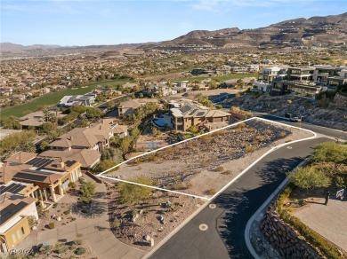 Perched on a 0.79-acre elevated lot in the prestigious MacDonald on Dragon Ridge Country Club in Nevada - for sale on GolfHomes.com, golf home, golf lot