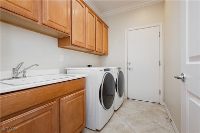 Highly upgraded Lincoln model with paver driveway, large on Revere Golf Club in Nevada - for sale on GolfHomes.com, golf home, golf lot