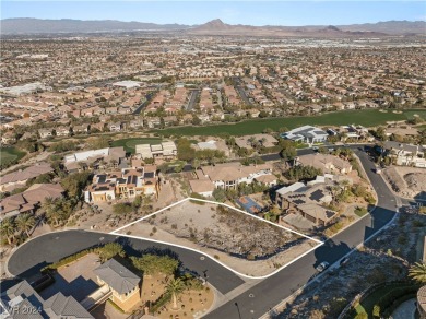 Perched on a 0.79-acre elevated lot in the prestigious MacDonald on Dragon Ridge Country Club in Nevada - for sale on GolfHomes.com, golf home, golf lot