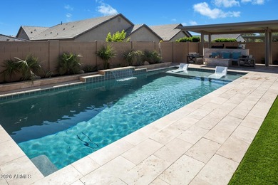 Tucked within the exclusive gated community of Verrado Highlands on Verrado Golf Club - Victory in Arizona - for sale on GolfHomes.com, golf home, golf lot