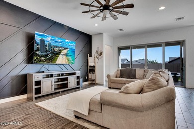 Tucked within the exclusive gated community of Verrado Highlands on Verrado Golf Club - Victory in Arizona - for sale on GolfHomes.com, golf home, golf lot