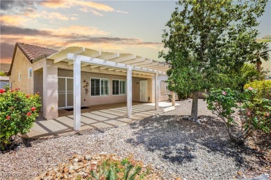 Highly upgraded Lincoln model with paver driveway, large on Revere Golf Club in Nevada - for sale on GolfHomes.com, golf home, golf lot