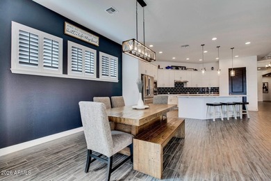 Tucked within the exclusive gated community of Verrado Highlands on Verrado Golf Club - Victory in Arizona - for sale on GolfHomes.com, golf home, golf lot