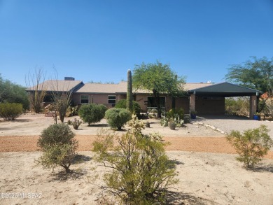 Surround yourself with the serenity of nature in this on Arizona National Golf Club in Arizona - for sale on GolfHomes.com, golf home, golf lot