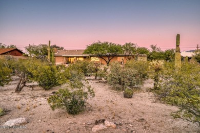 Surround yourself with the serenity of nature in this on Arizona National Golf Club in Arizona - for sale on GolfHomes.com, golf home, golf lot