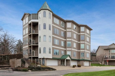 EXPANSIVE CONDO LIVING OVERLOOKING BROWN DEER GOLF COURSE AND on Brown Deer Golf Club in Iowa - for sale on GolfHomes.com, golf home, golf lot