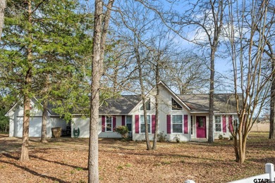 Tucked away on a beautifully wooded lot in the heart of East on Holly Lake Ranch Golf Club in Texas - for sale on GolfHomes.com, golf home, golf lot