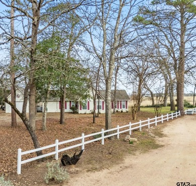 Tucked away on a beautifully wooded lot in the heart of East on Holly Lake Ranch Golf Club in Texas - for sale on GolfHomes.com, golf home, golf lot