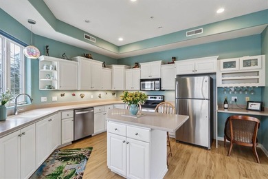 EXPANSIVE CONDO LIVING OVERLOOKING BROWN DEER GOLF COURSE AND on Brown Deer Golf Club in Iowa - for sale on GolfHomes.com, golf home, golf lot