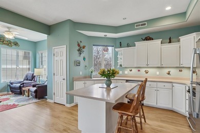 EXPANSIVE CONDO LIVING OVERLOOKING BROWN DEER GOLF COURSE AND on Brown Deer Golf Club in Iowa - for sale on GolfHomes.com, golf home, golf lot