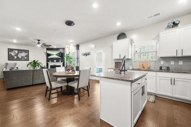 Welcome to 8033 Louis Drive, an exceptional 5-bedroom, 4.5-bath on Canongate At Heron Bay in Georgia - for sale on GolfHomes.com, golf home, golf lot