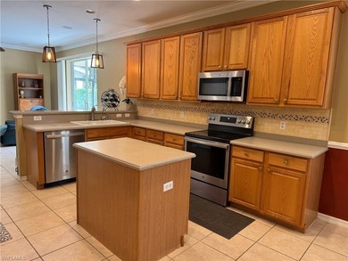 Welcome to this popular and beautifully maintained Ellington on Valencia Golf and Country Club in Florida - for sale on GolfHomes.com, golf home, golf lot