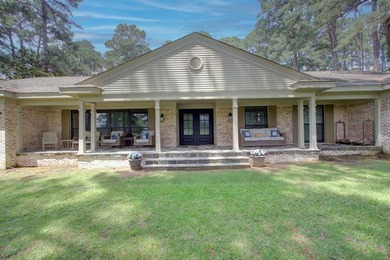 Luxurious brick home on the prestigious Texarkana Country Club on Texarkana Golf and Country Club in Arkansas - for sale on GolfHomes.com, golf home, golf lot