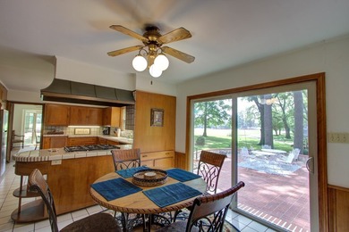 Luxurious brick home on the prestigious Texarkana Country Club on Texarkana Golf and Country Club in Arkansas - for sale on GolfHomes.com, golf home, golf lot