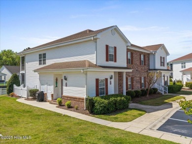 This inviting second-floor condo in the gated community of on Brunswick Plantation and Golf Resorts in North Carolina - for sale on GolfHomes.com, golf home, golf lot