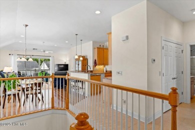 This inviting second-floor condo in the gated community of on Brunswick Plantation and Golf Resorts in North Carolina - for sale on GolfHomes.com, golf home, golf lot