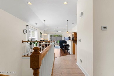 This inviting second-floor condo in the gated community of on Brunswick Plantation and Golf Resorts in North Carolina - for sale on GolfHomes.com, golf home, golf lot