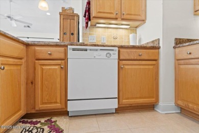 This inviting second-floor condo in the gated community of on Brunswick Plantation and Golf Resorts in North Carolina - for sale on GolfHomes.com, golf home, golf lot