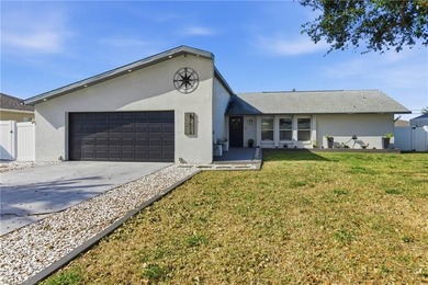 Step into a home where modern luxury meets timeless character on Royal Tee Country Club in Florida - for sale on GolfHomes.com, golf home, golf lot