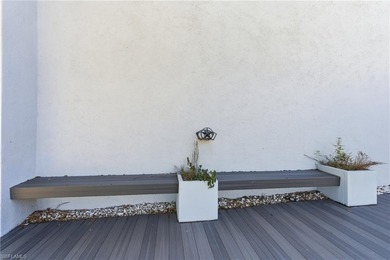 Step into a home where modern luxury meets timeless character on Royal Tee Country Club in Florida - for sale on GolfHomes.com, golf home, golf lot