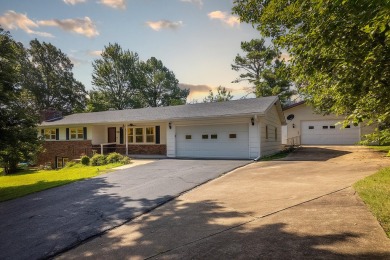 Welcome to this beautifully maintained 5-bed, 2.5-bath home on West Plains Country Club in Missouri - for sale on GolfHomes.com, golf home, golf lot