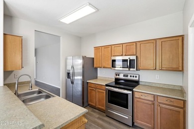 If you've been waiting for a home where you don't have to on The Golf Club At Johnson Ranch in Arizona - for sale on GolfHomes.com, golf home, golf lot