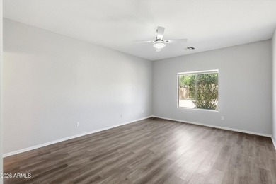 If you've been waiting for a home where you don't have to on The Golf Club At Johnson Ranch in Arizona - for sale on GolfHomes.com, golf home, golf lot