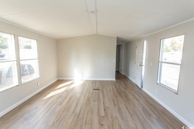 Newly renovated oversized single-wide manufactured home situated on Prestwick Country Club in South Carolina - for sale on GolfHomes.com, golf home, golf lot