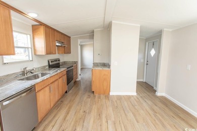Newly renovated oversized single-wide manufactured home situated on Prestwick Country Club in South Carolina - for sale on GolfHomes.com, golf home, golf lot