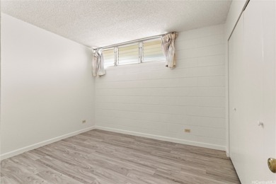 Come home to tranquil golf course views in this 2-bedroom on Honolulu Country Club in Hawaii - for sale on GolfHomes.com, golf home, golf lot